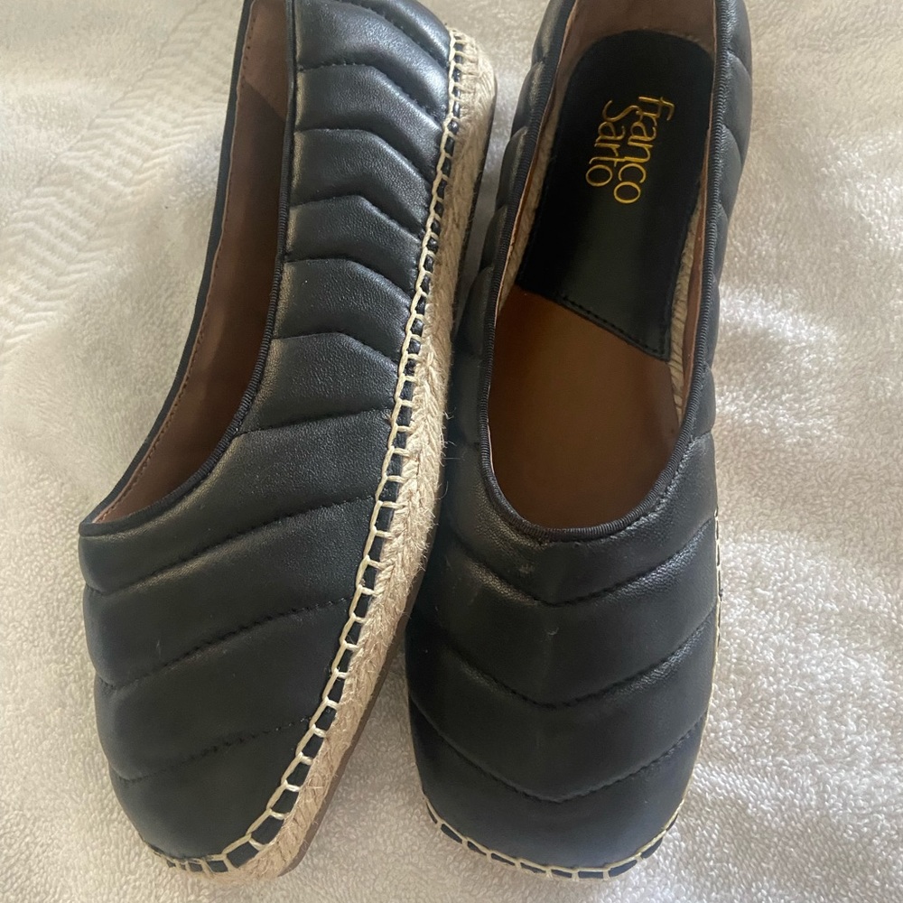 Beautiful black leather quilted slip ons by Franco Sarto. New. Never worn.